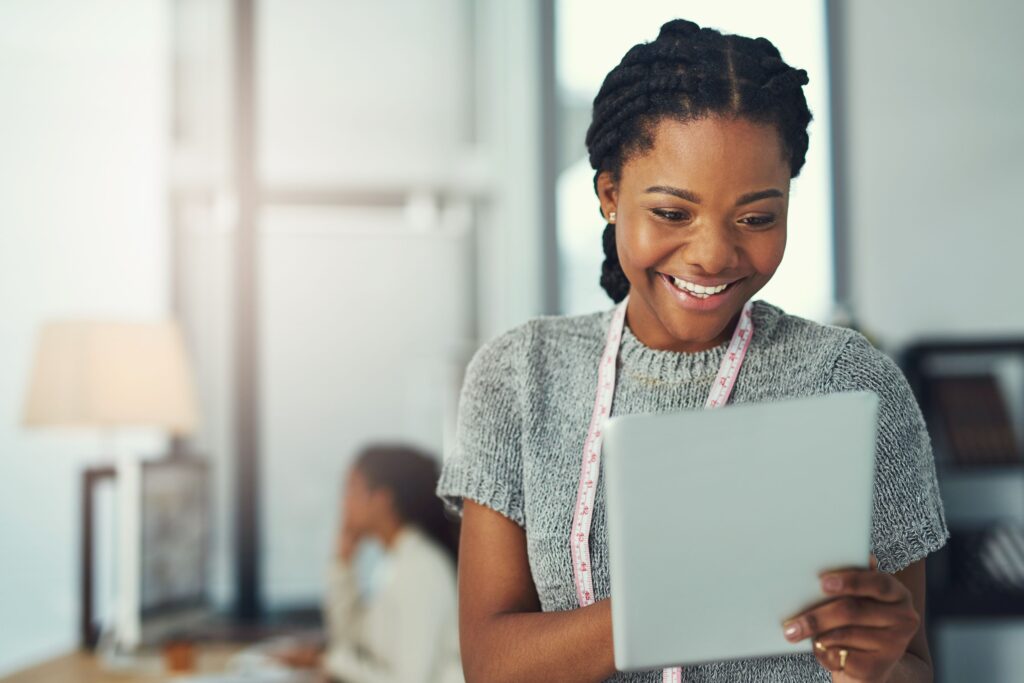 hospitality industry young woman looking on tablet
