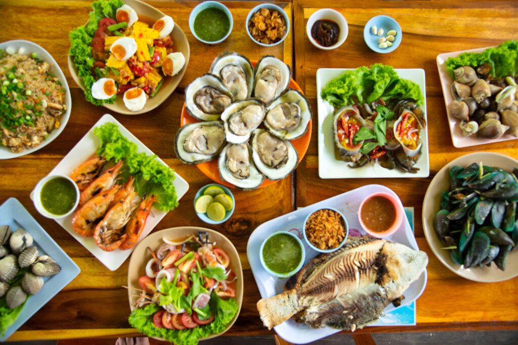 Dîner de Noël avec le traditionnel festin italien des Sept Poissons, composé de fruits de mer frais et de plats de pâtes