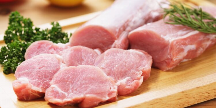 _Pork Myths - pork meat on a board with persil