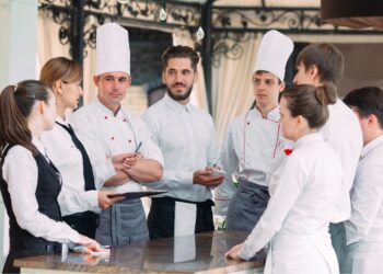 Staff Productivity restaurant staff listen to chef