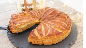 Galette rois traditional French king cake with golden puff pastry for Three Kings celebration