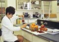 A food scientist examines natural ingredients in a laboratory, reflecting the spirit of food innovation at IFT FIRST