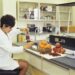 A food scientist examines natural ingredients in a laboratory, reflecting the spirit of food innovation at IFT FIRST