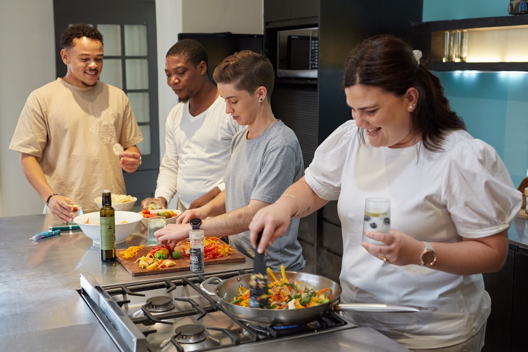 An audience watches a live cooking demonstration, reflecting how British food culture now values education as much as flavour