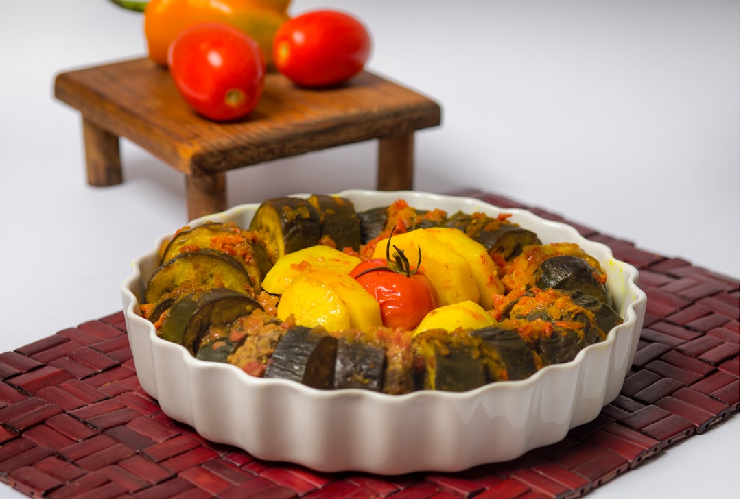 A chef using classical technique to prepare eggplant for a Mediterranean cooking dish