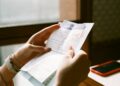 Restaurant owner checking energy relief eligibility on a bill